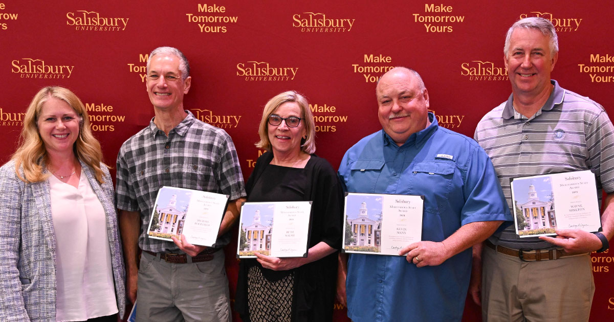 SU President Carolyn Ringer Lepre with 2024 Meritirous Staff Award recipients